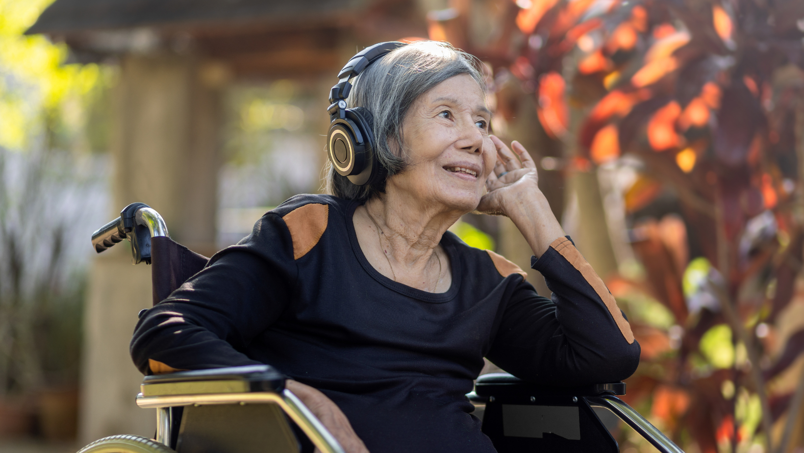 elderly woman listening to music